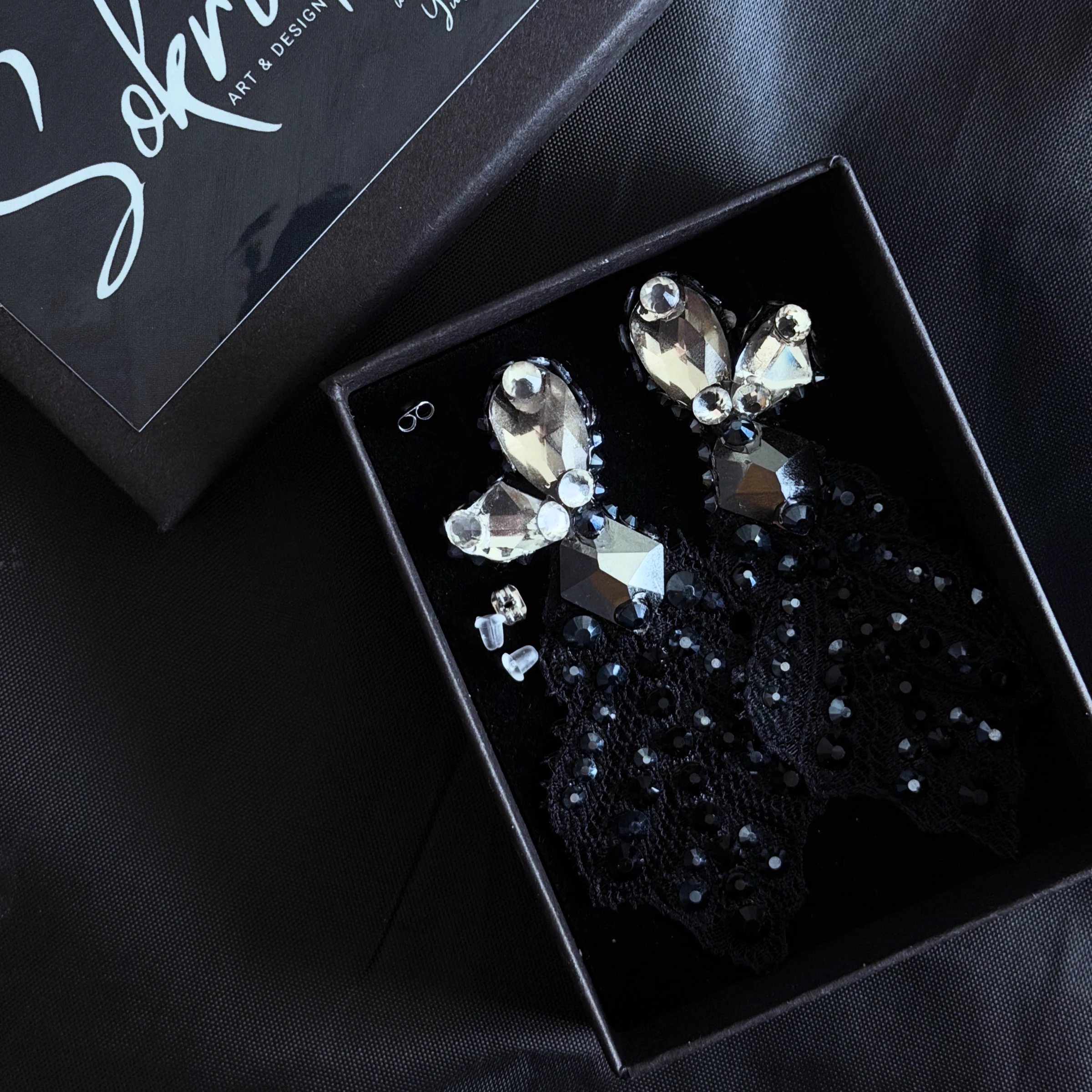 Eclipse crystal and black lace accessories in their presentation box