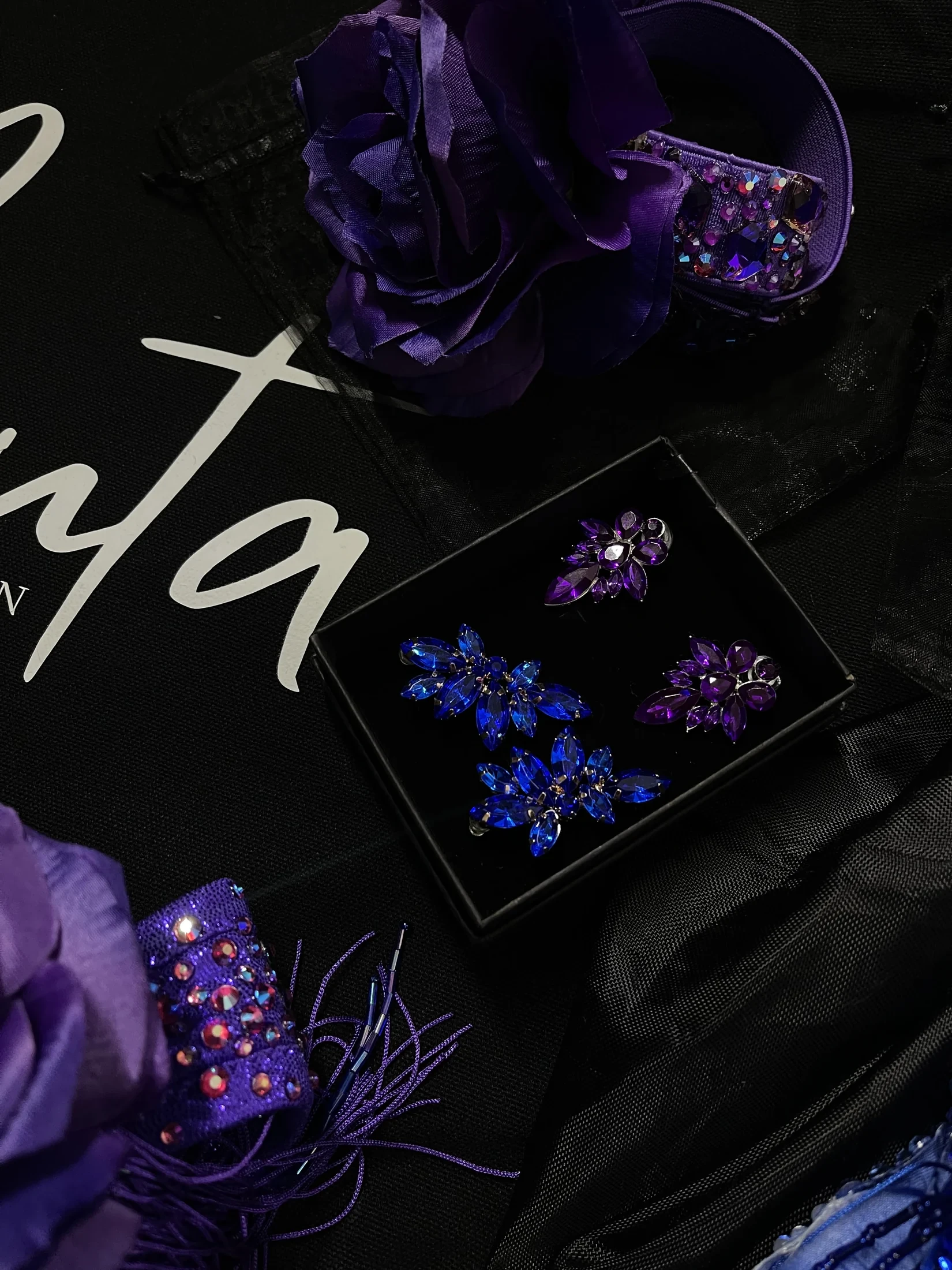 Matching sapphire and violet earrings