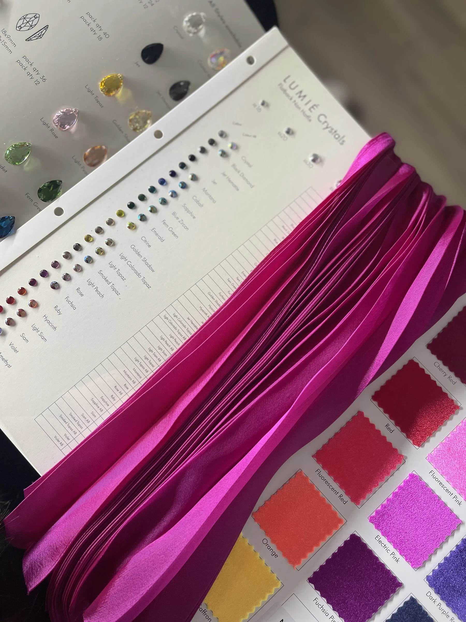 Fuchsia satin and pleated chiffon fabric study