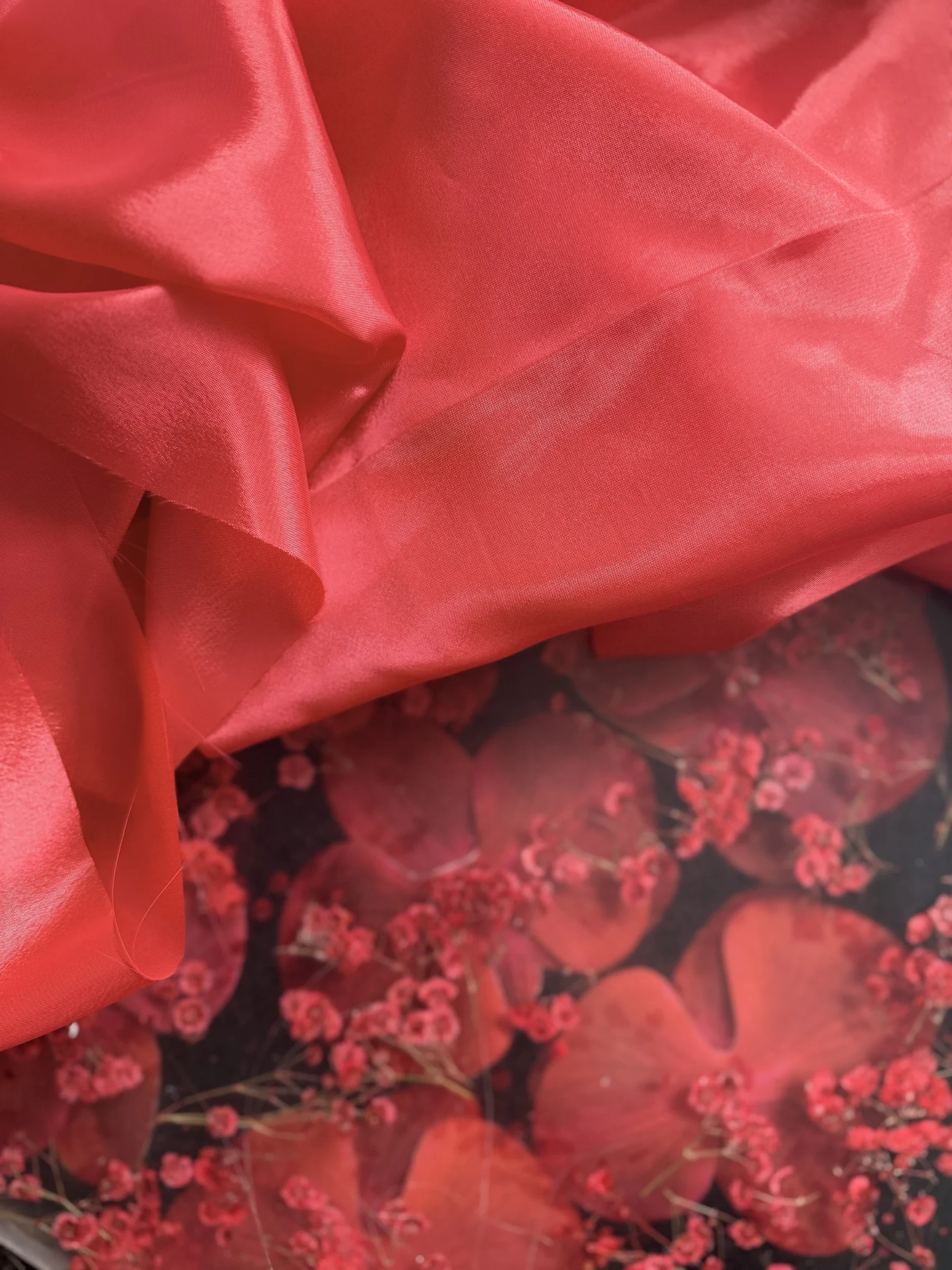Layered crimson skirt fabrics