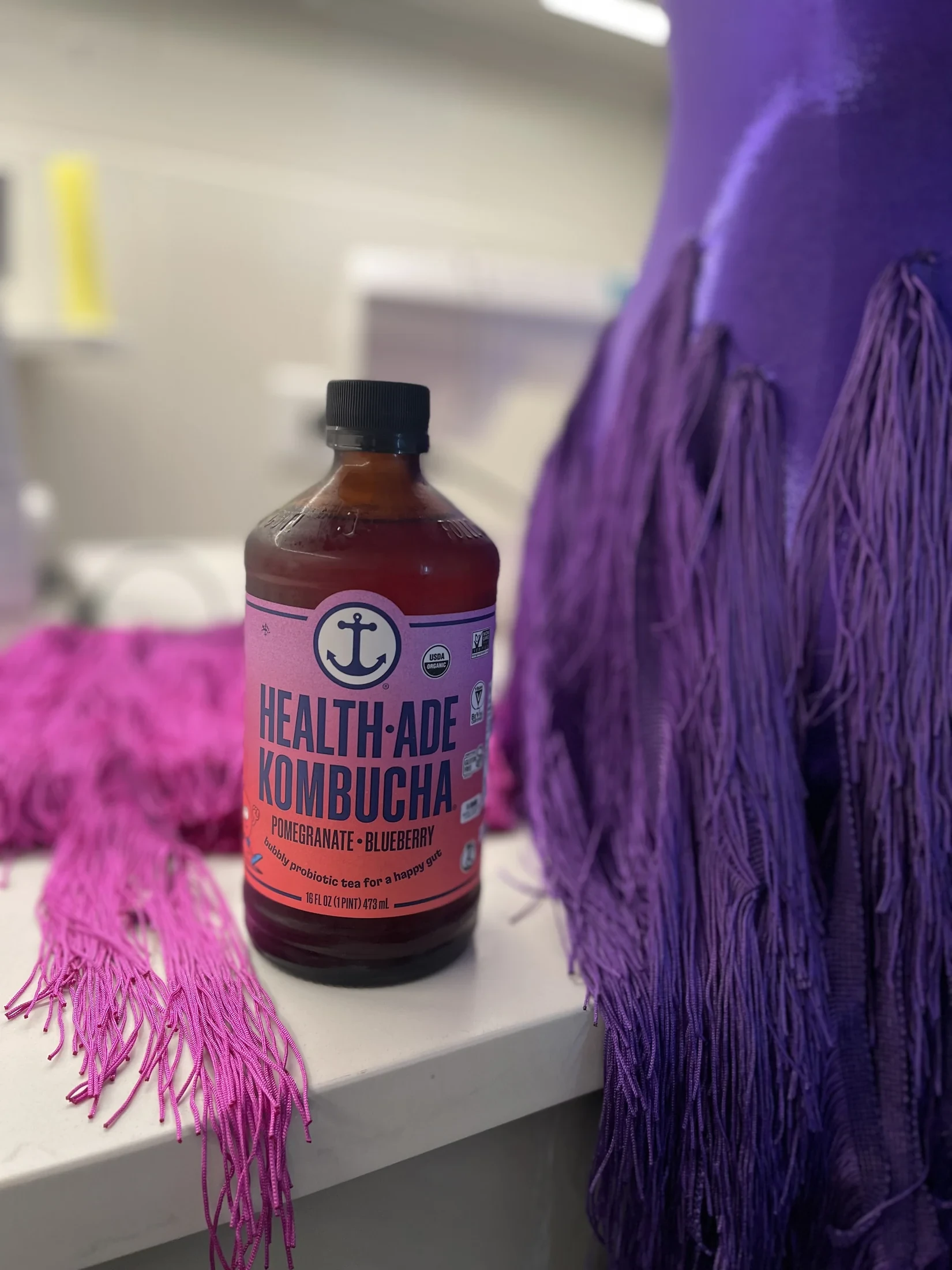 Velocity gown in violet beside its color inspiration