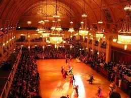 Ballroom competition inside a large ornate hall