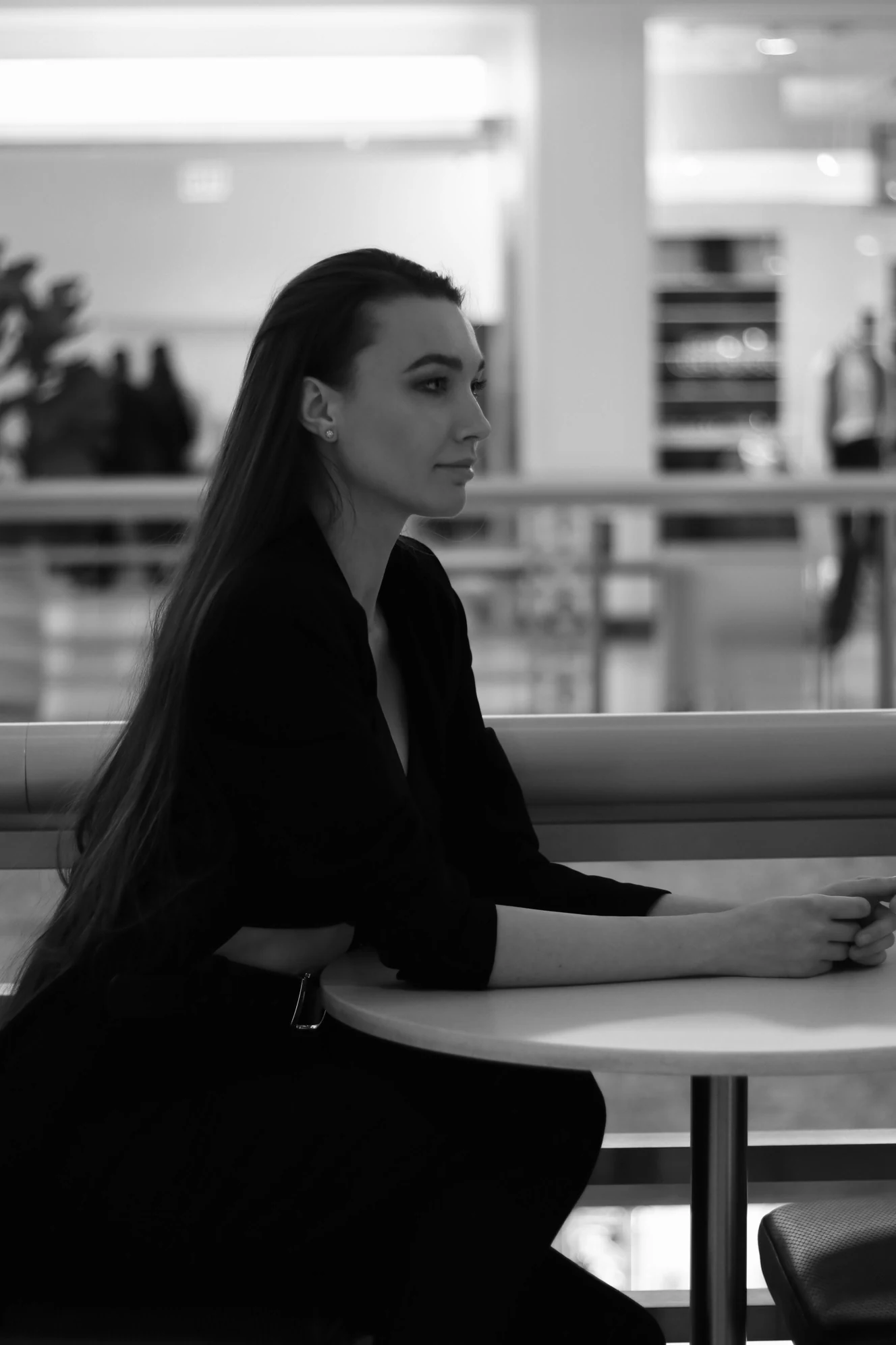 Designer Yuliia Sokruta seated in the studio